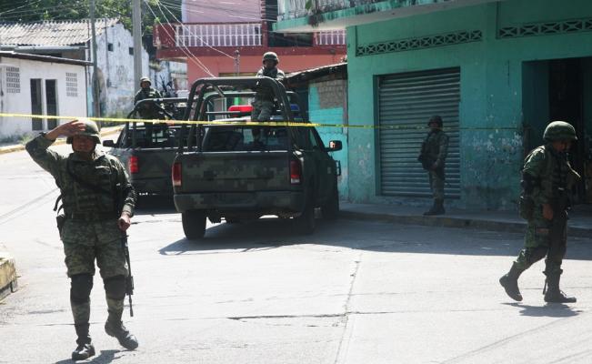 Hallan al menos 12 cuerpos en barranca de Guerrero