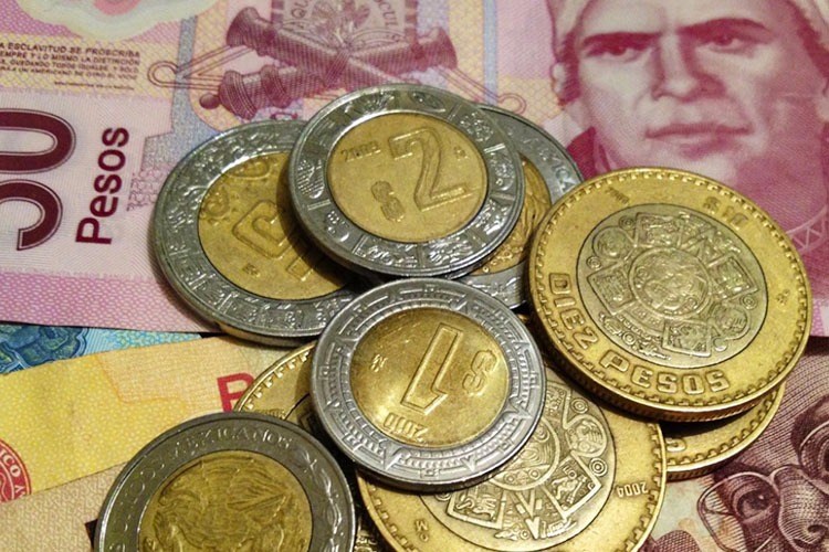 Peso a la baja por la Reserva Federal de EU