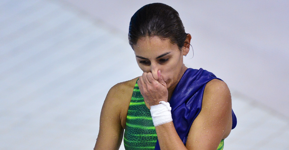 Mexico's Paola Espinosa Sanchez reacts after performing a dive during the women's 10m platform final at the London 2012 Olympic Games at the Aquatics Centre