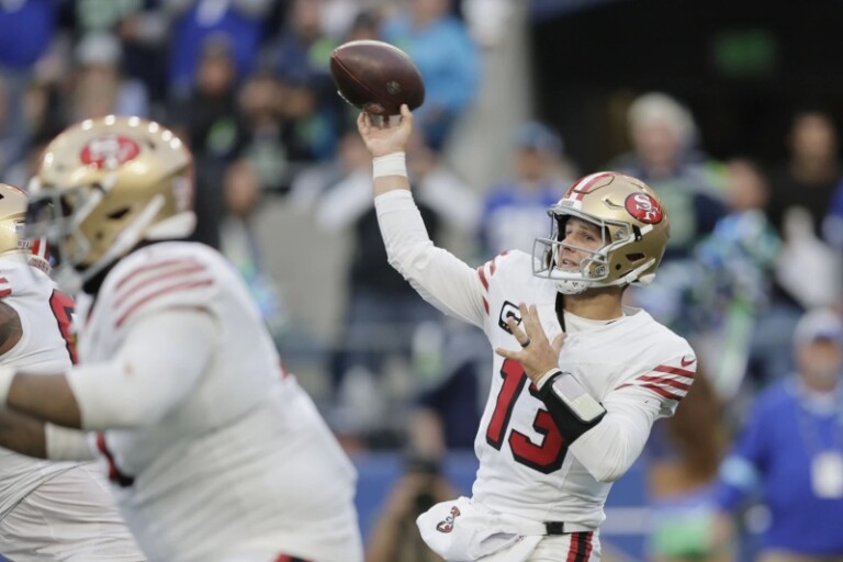 Brock Purdy lanza 3 TD y los 49ers vencen a los Seahawks 36-24 para pasar a la cima de la división